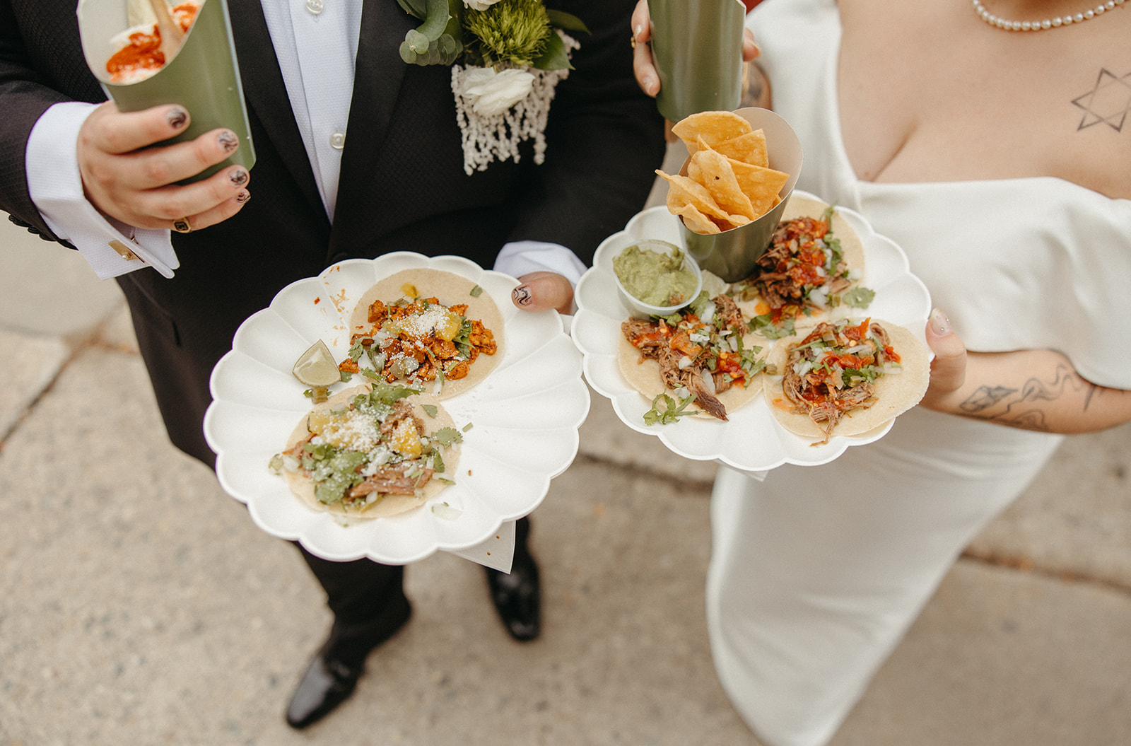 Couple getting food from the taco truck at their wedding reception