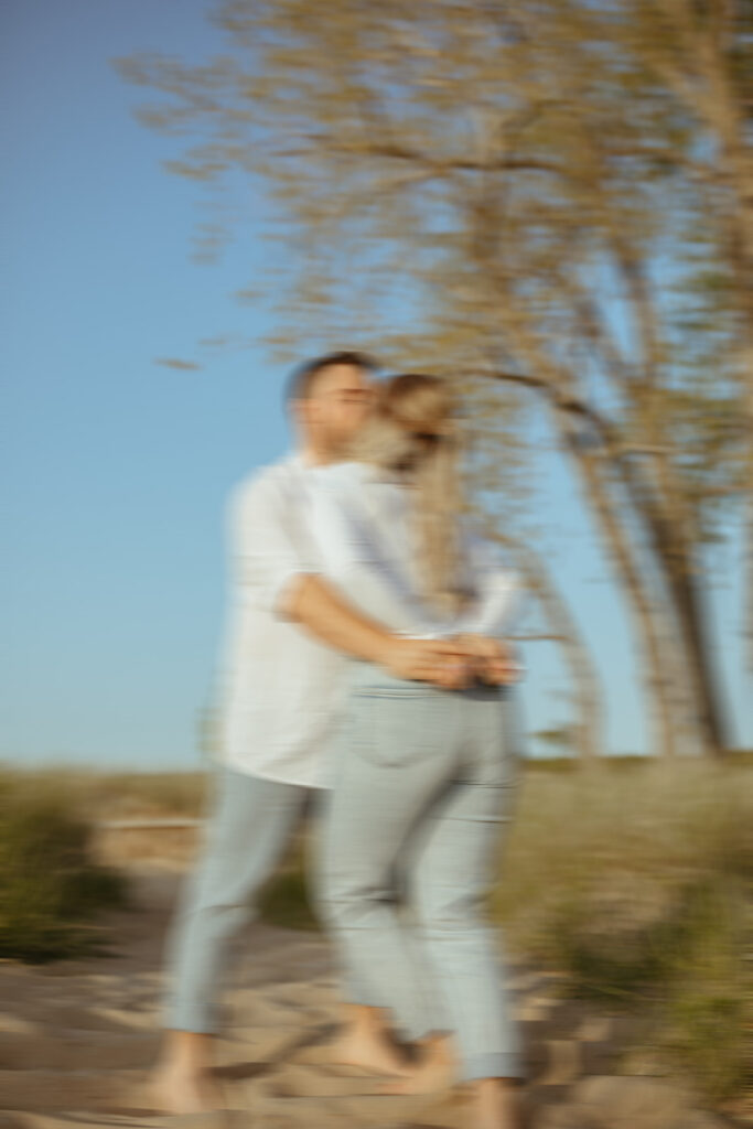Blurry photo of couple at the beach