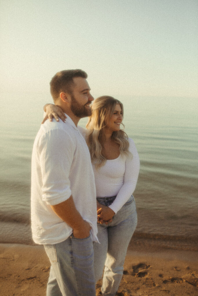 Couple at Sleeper State Park for their Michigan beach engagement photos