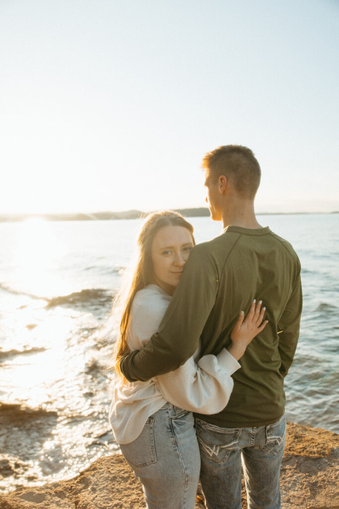 Couples sunset Marquette Michigan engagement photos at Black Rock