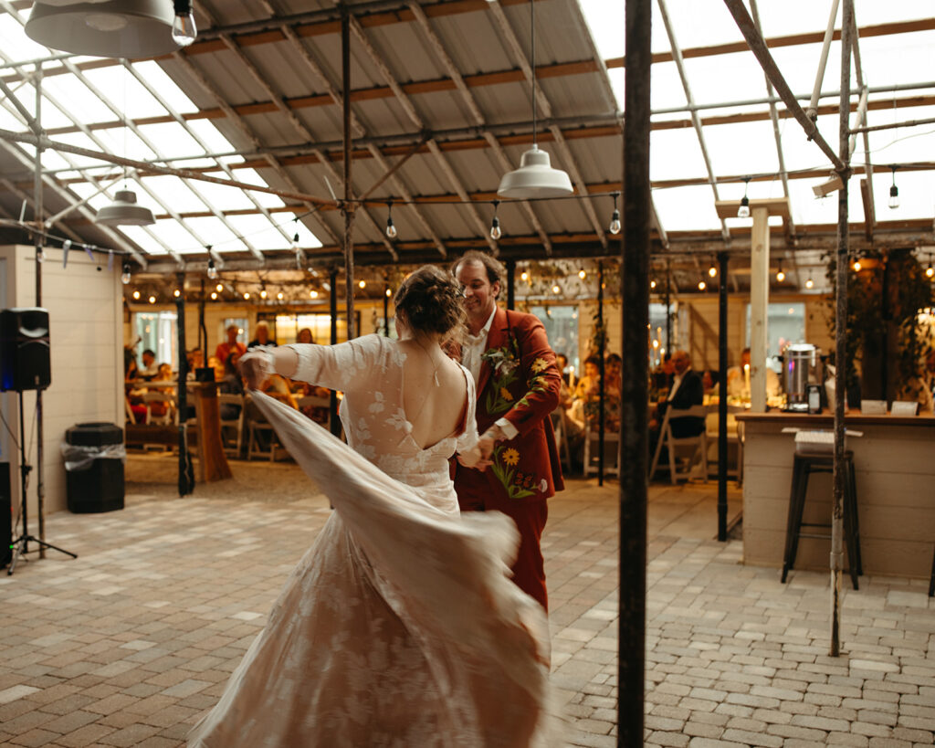 Bride and grooms first dance during their Greenhouse at Goldner Walsh wedding reception
