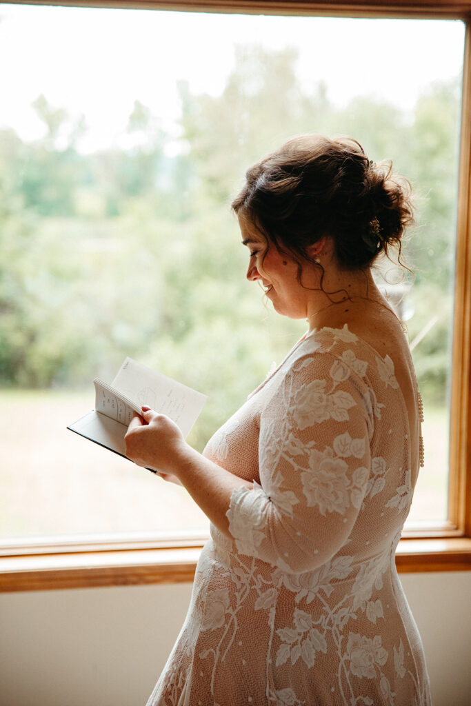 Bride reading a gift from her soon to be husband