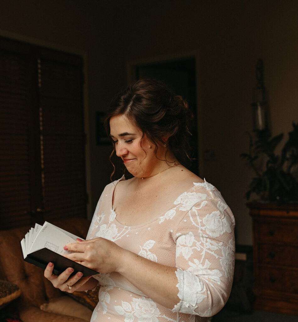 Bride reading a gift from her soon to be husband