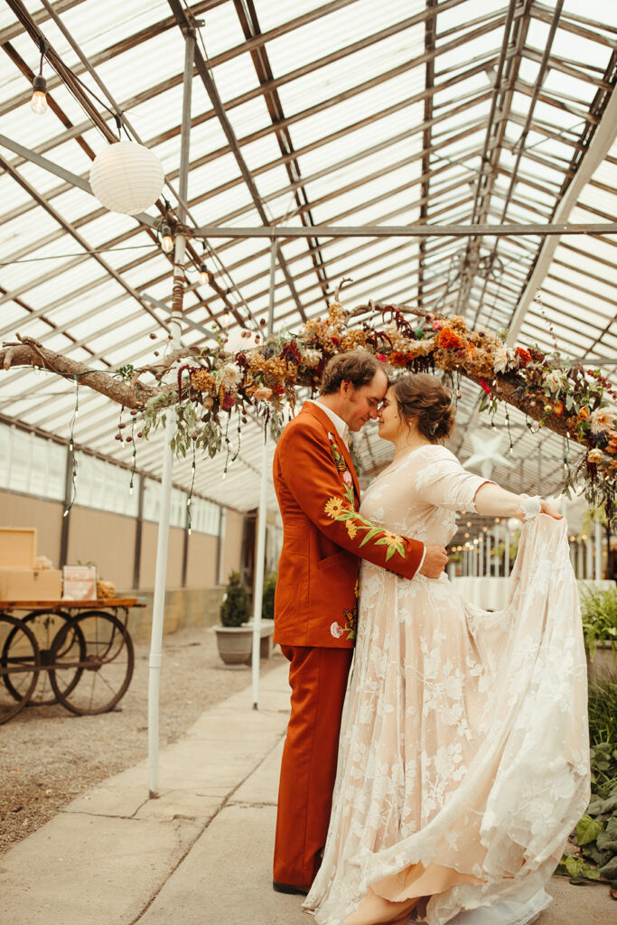 Bride and groom portraits from a Greenhouse at Goldner Walsh wedding reception captured by Marissa Dillon Photography