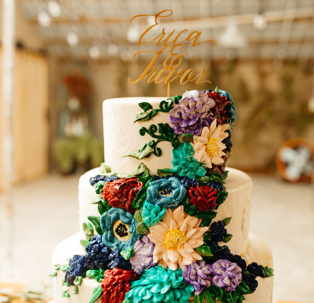 Colorful floral three tiered wedding cake