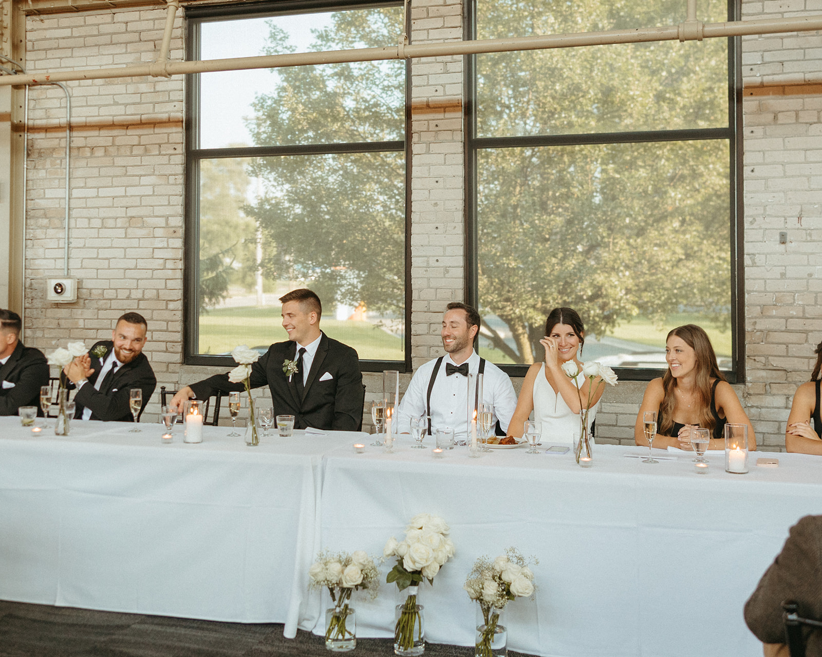 Wedding speeches at Baker Lofts Holland MI wedding reception