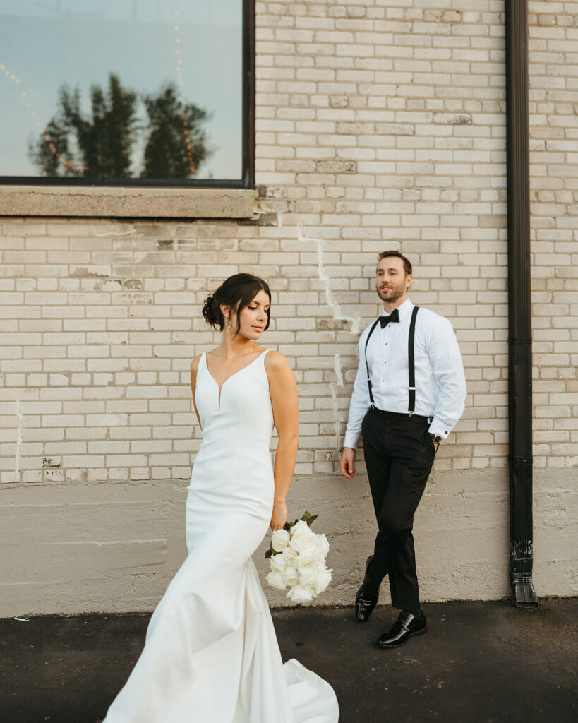 Editorial bride and grooms portraits outside Beker Lofts Holland MI wedding  venue