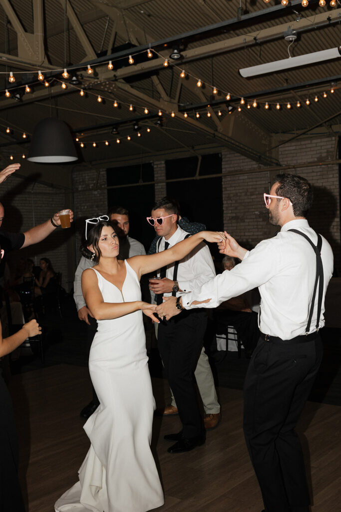 Open dancing at a Baker Lofts Holland MI wedding reception