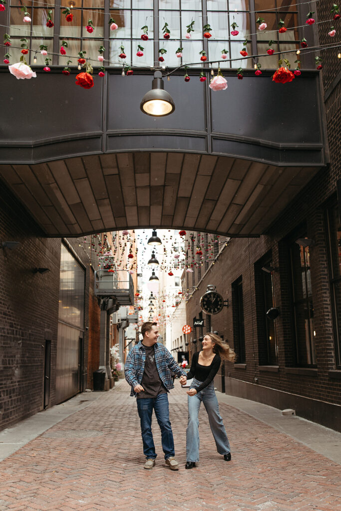 Couple walking down The Belt alley in Detroit, Michigan