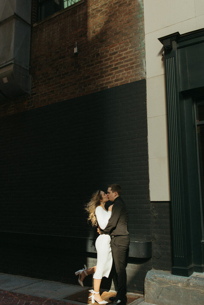 Couple kissing during their engagement session