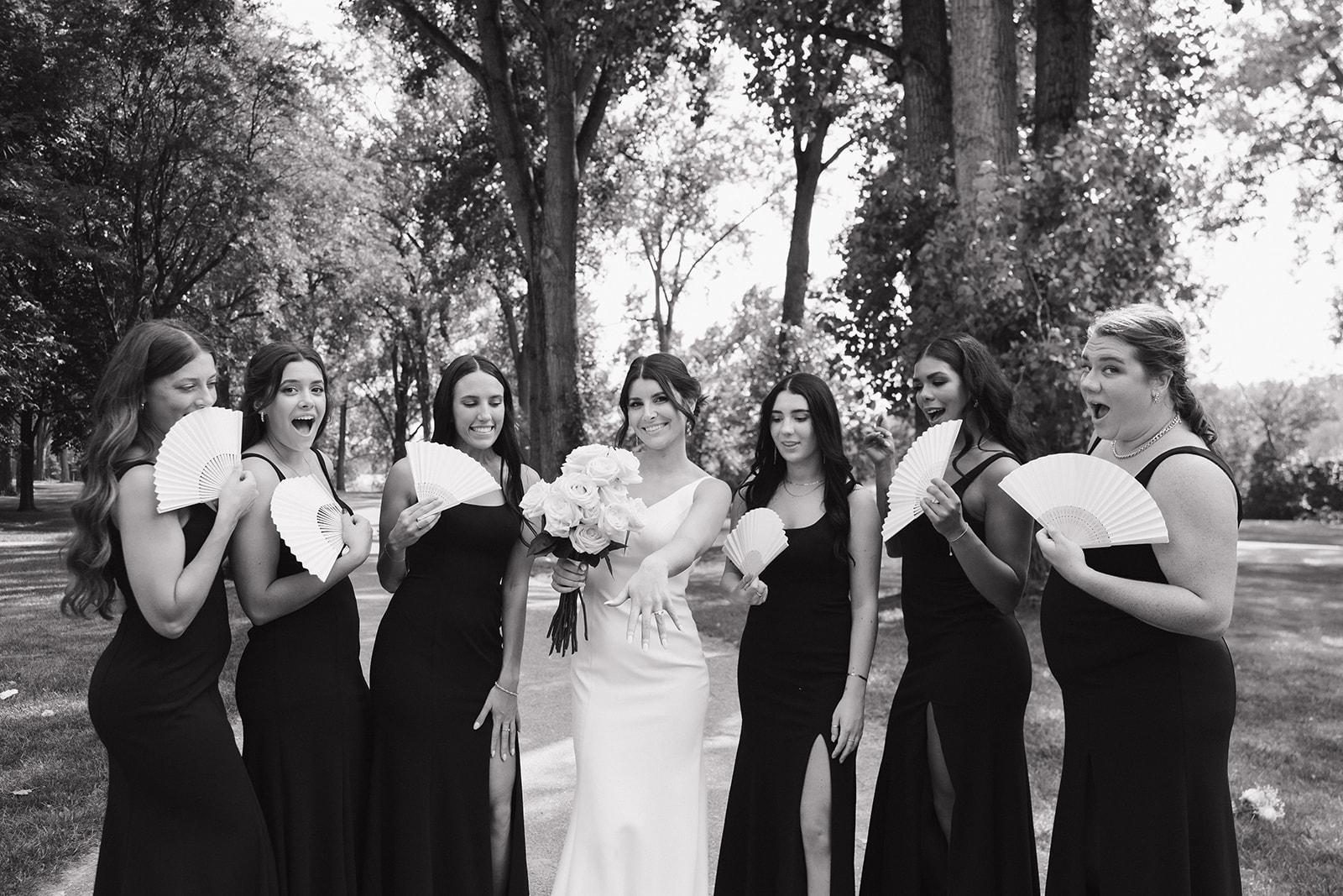 Black and white photo of a bride and her bridesmaids