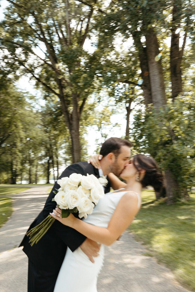 Grand Rapids wedding portraits of a bride and groom kissing