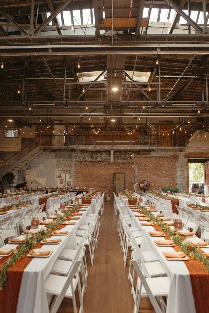 An elegant rustic indoor wedding reception at Jam Handy wedding venue in Detroit, Michigan