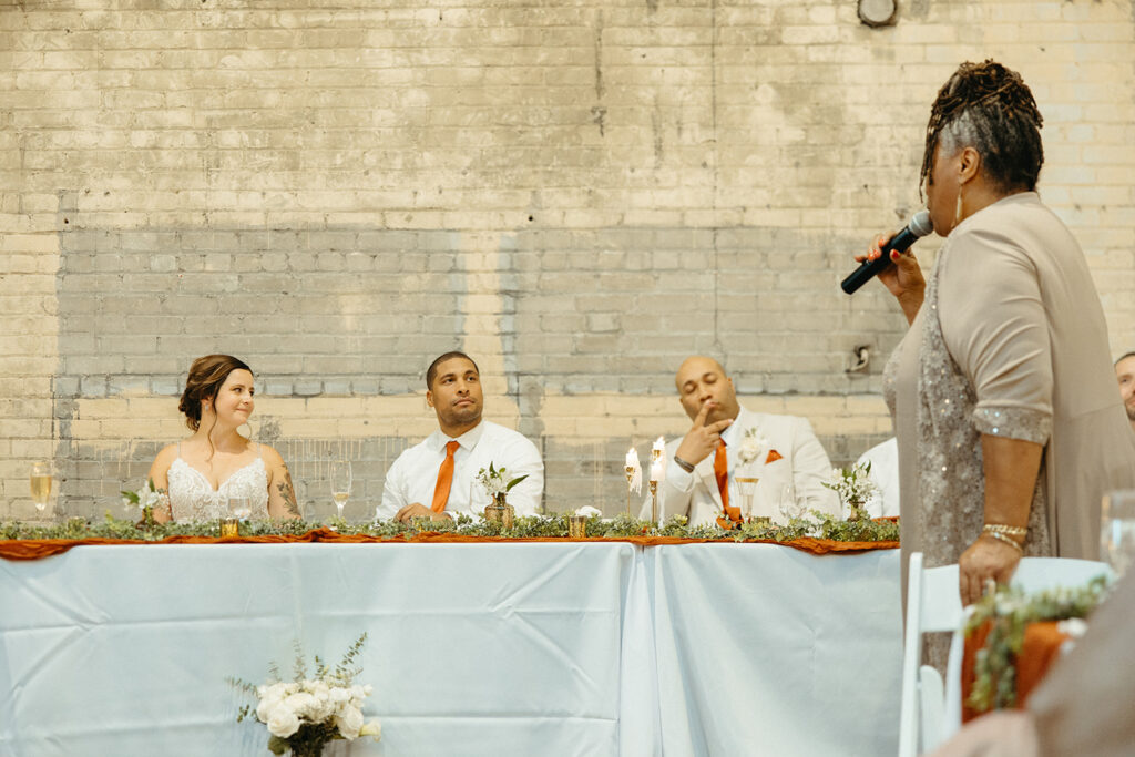 Mother of the groom giving a speech  at Jam Handy wedding venue in Detroit, Michigan