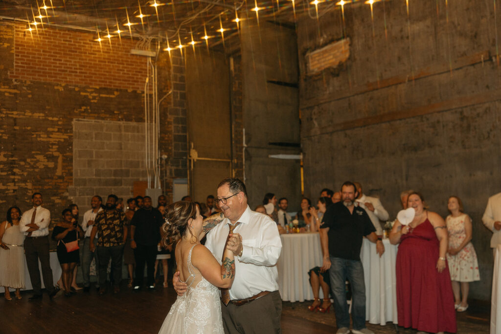 Bride having a first dance with her father  at Jam Handy wedding venue in Detroit, Michigan