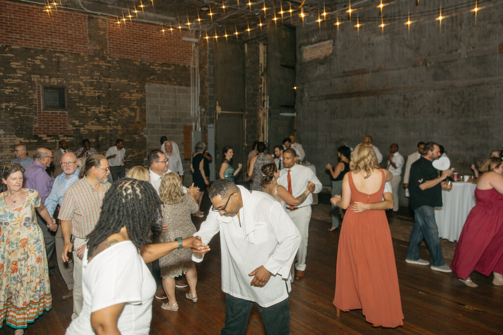 Wedding guests dancing at Jam Handy wedding venue during a reception