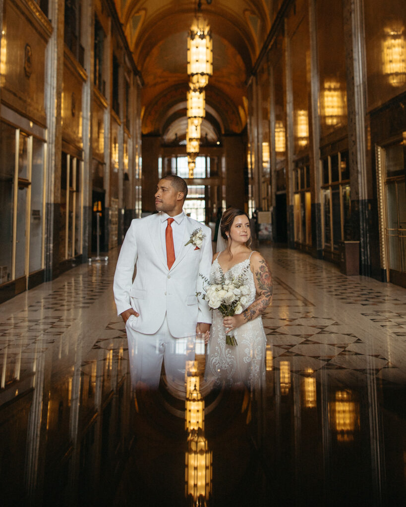 Double exposure photo of a bride and groom in the Grand Arcade of Fisher Building in Detroit, Michigan