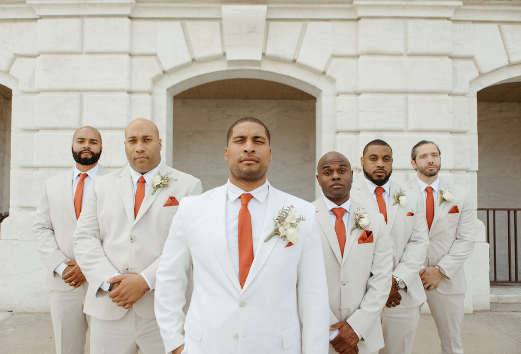 Groom and groomsmen portraits outside of Detroit Institute of Arts Museum