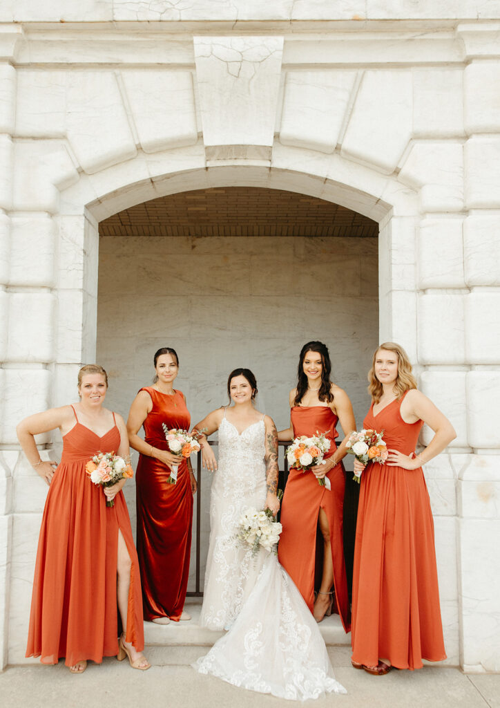 Bride and bridesmaids portraits outside of Detroit Institute of Arts Museum