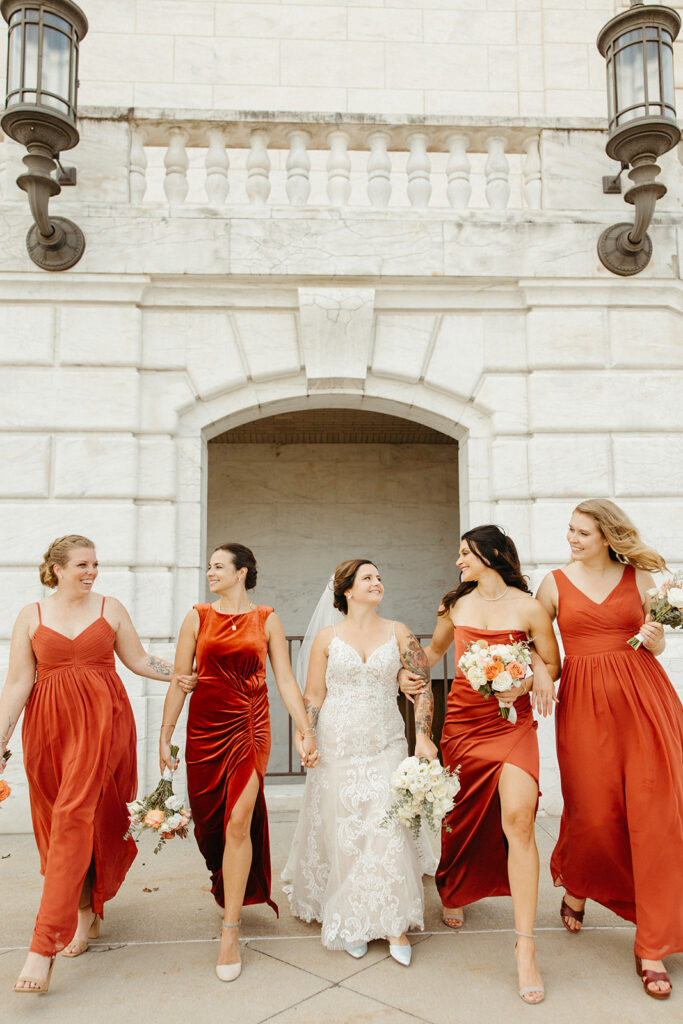 Bride and bridesmaids portraits outside of Detroit Institute of Arts Museum