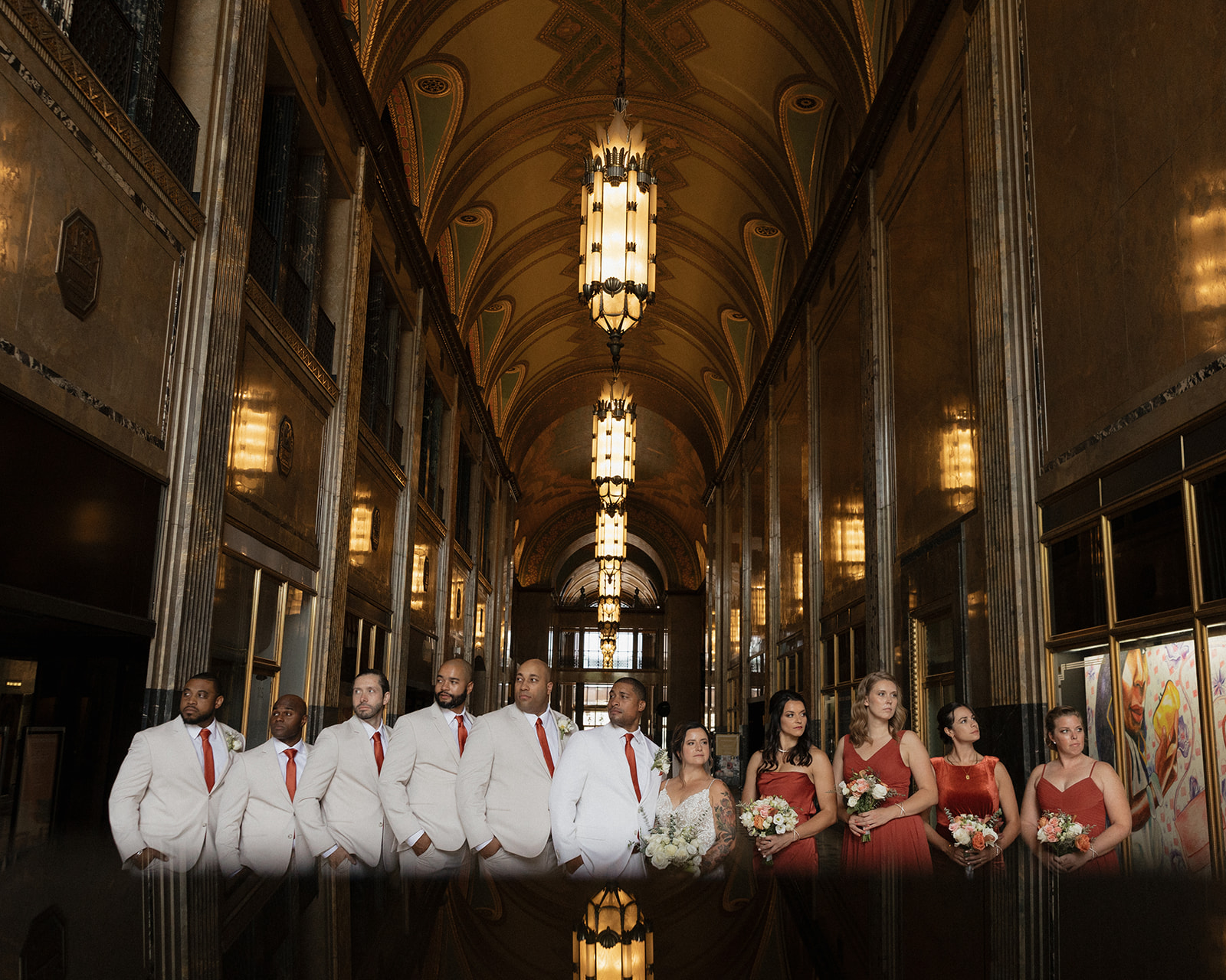 Wedding party portraits in the Grand Arcade of Fisher Building in Detroit, Michigan