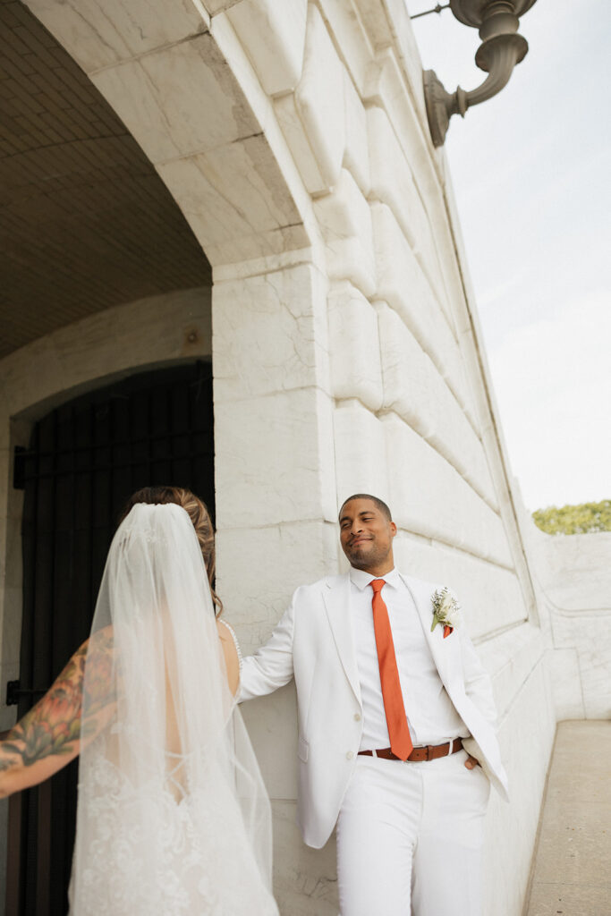 Bride and grooms portraits outside of Detroit Institute of Arts Museum