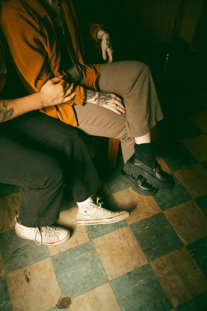 Man and woman sitting together in a vintage kitchen