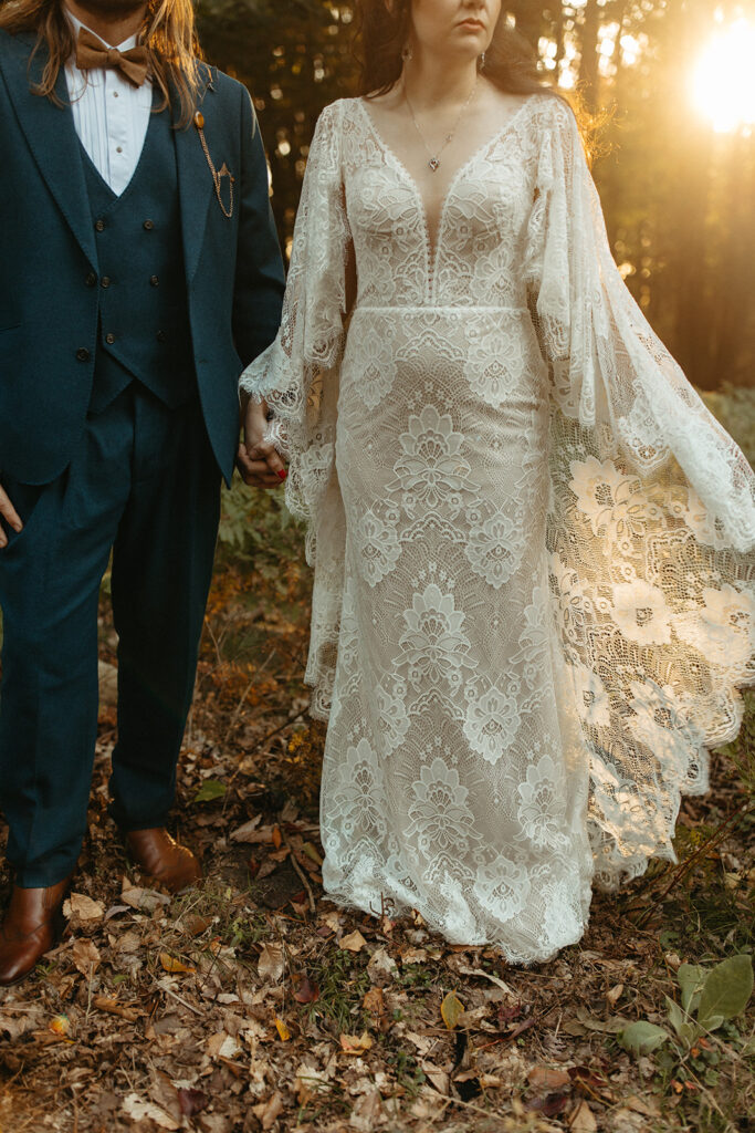 Bride and grooms outdoor wedding portraits from their fall backyard wedding in Michigan