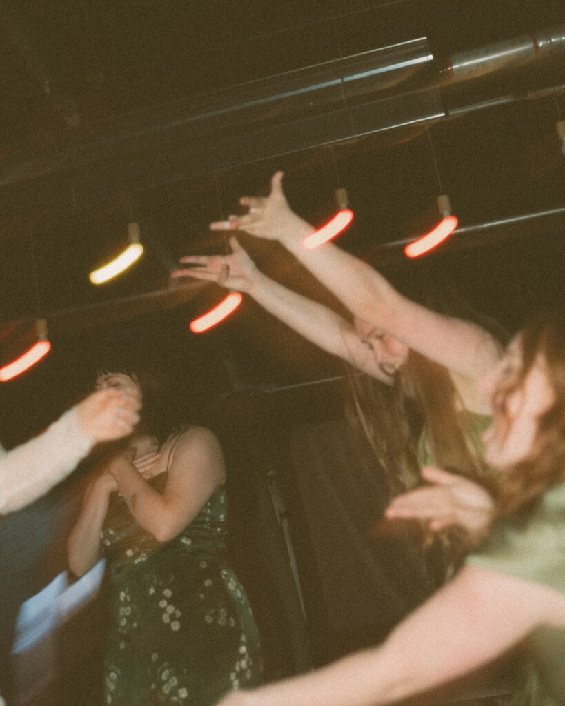 Wedding guests dancing during a Detroit wedding reception at Mabel Grey