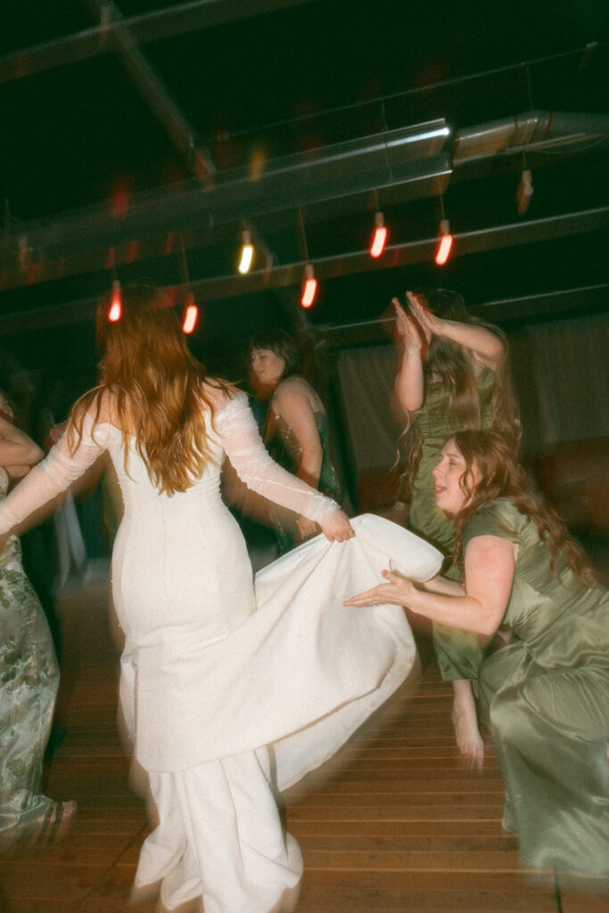 Bride dancing during her Detroit wedding reception at Mabel Grey