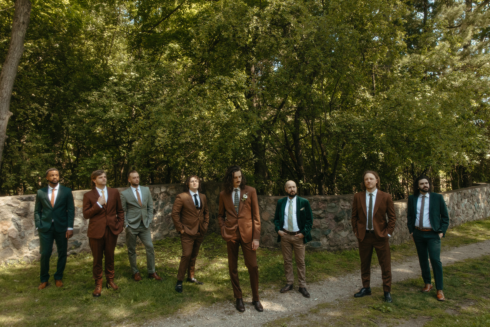 Outdoor groom and groomsmen portraits from a Stony Creek Metropark wedding in Detroit, Michigan