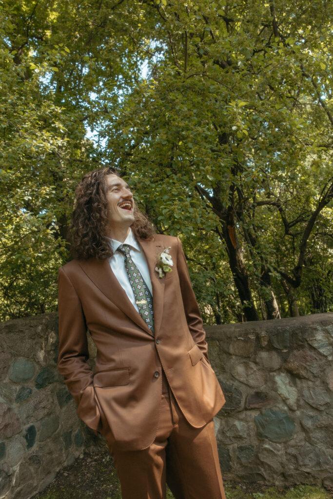 Outdoor grooms portraits from a Stony Creek Metropark wedding in Detroit, Michigan