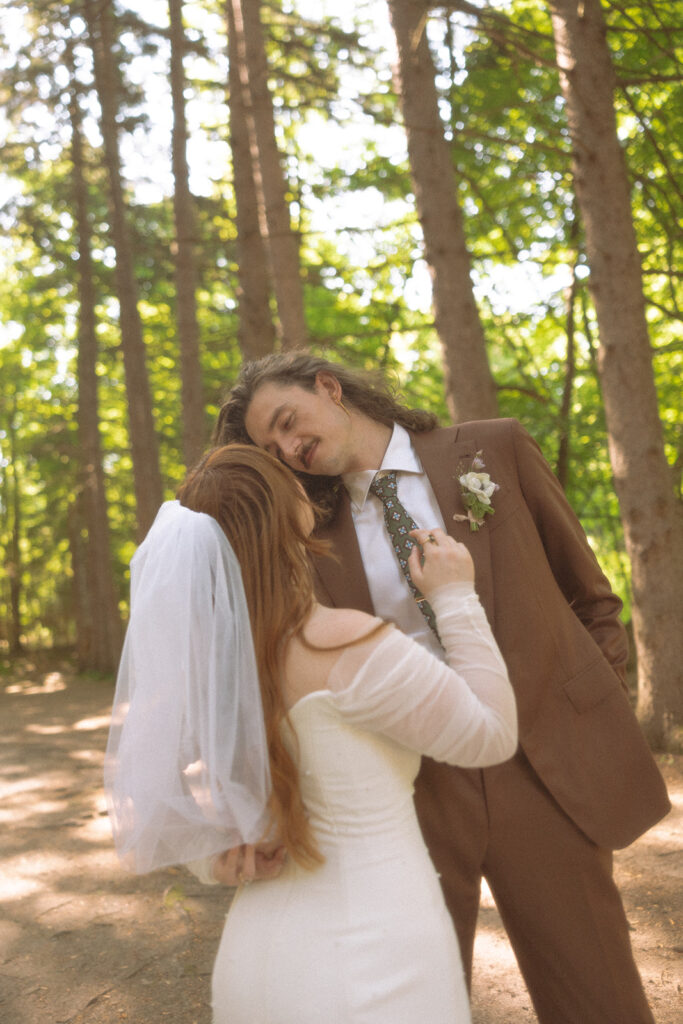 Bride and grooms portraits from their Stony Creek Metropark wedding in Detroit, Michigan