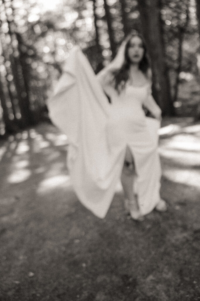 Black and white photo of a bride in Stony Creek Metro Park in Detroit, Michigan