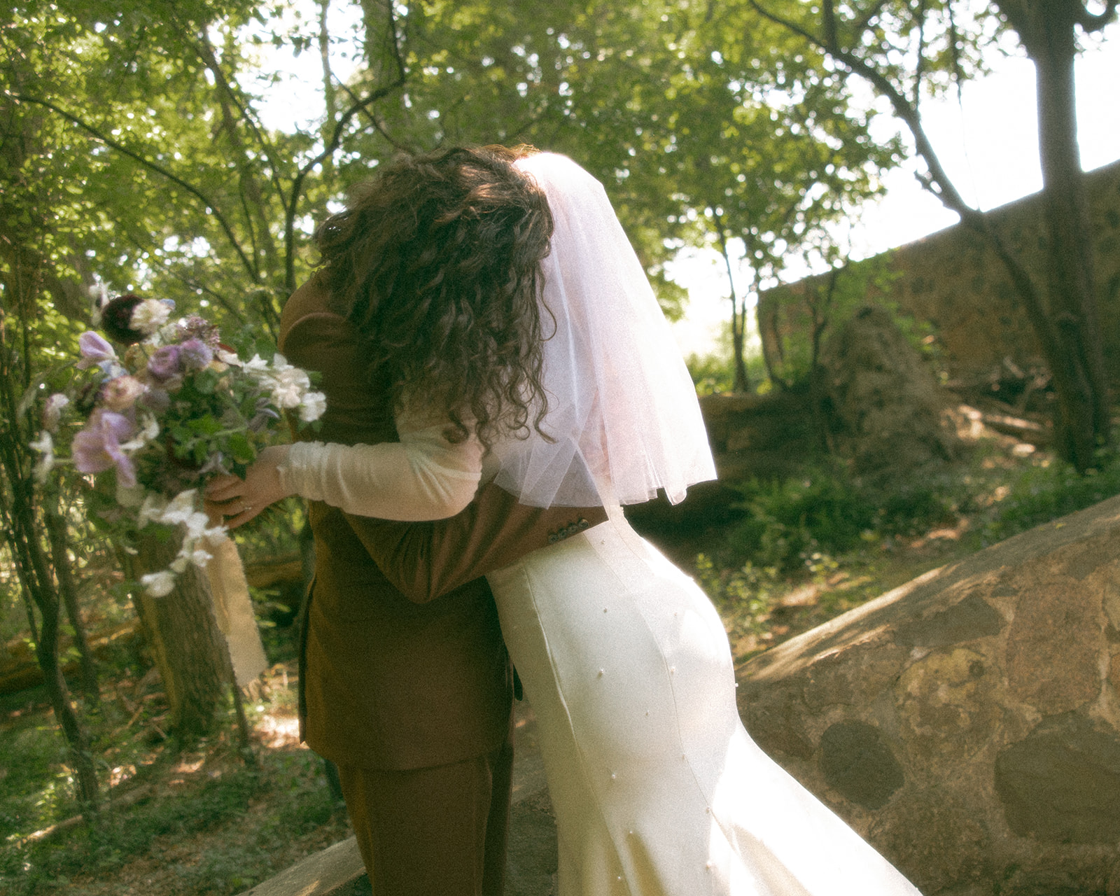 Bride and groom sharing their first look before their Stony Creek Metropark wedding ceremony in Detroit, Michigan