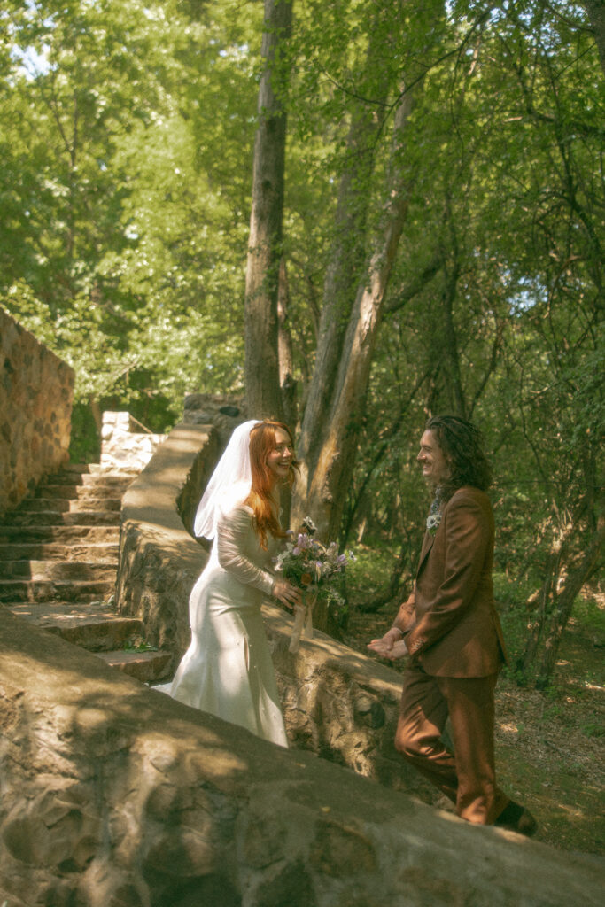 Bride and groom sharing their first look before their Stony Creek Metropark wedding ceremony in Detroit, Michigan