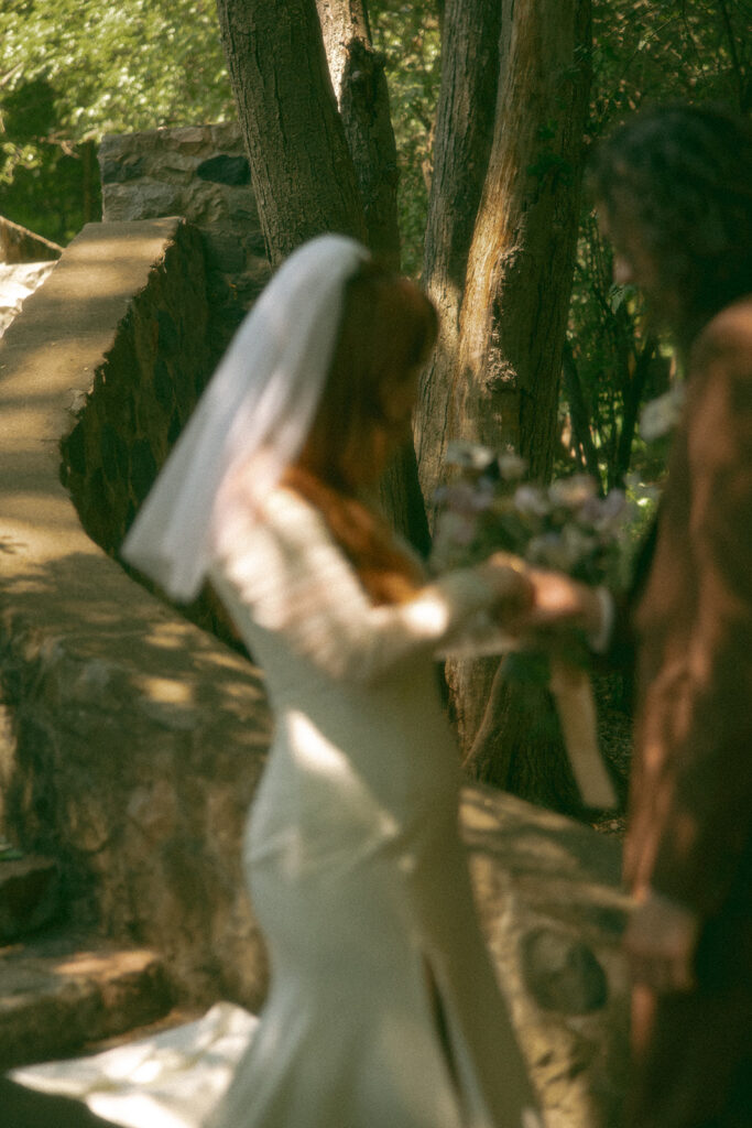 Bride and groom sharing their first look before their Stony Creek Metropark wedding ceremony in Detroit, Michigan