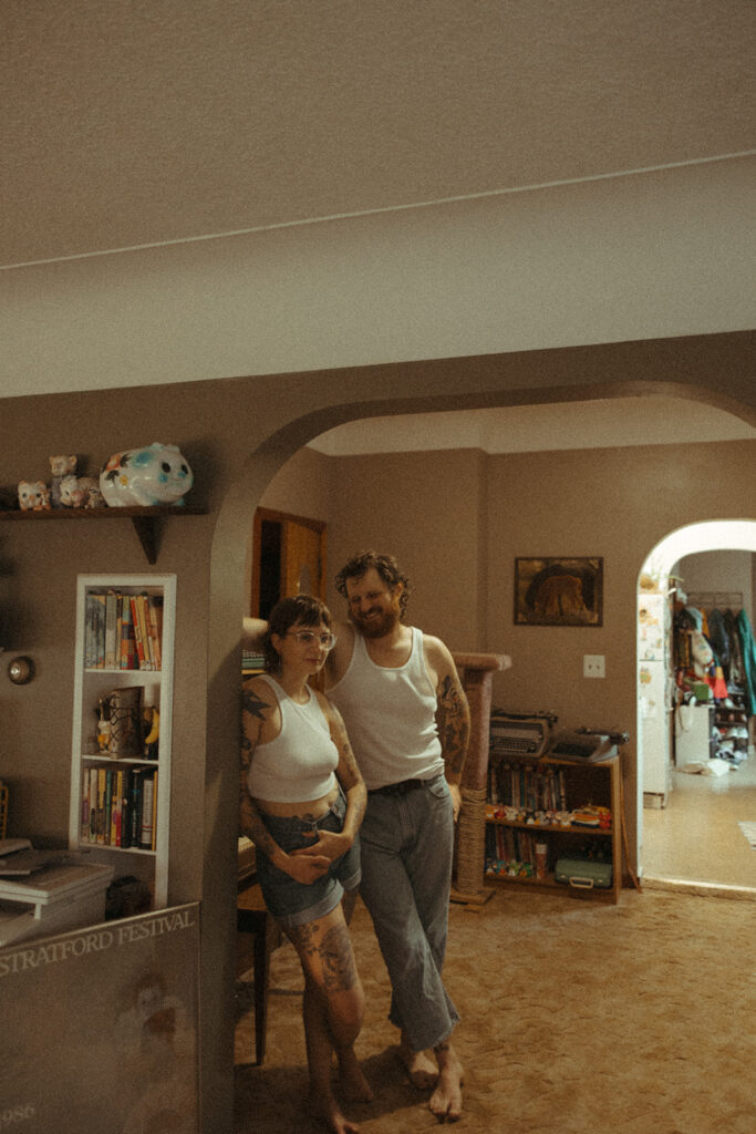 Man and woman posing for photos at-home in Grand Rapids, Michigan