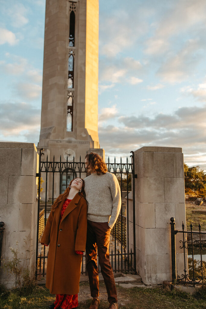 Man and woman posing during their Belle Isle engagement photos in Detroit, Michigan