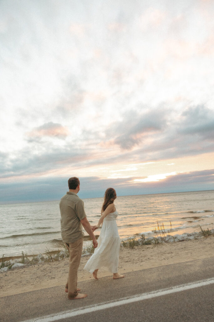 Couples Lake Michigan engagement photos at Duck Lake State Park in Muskegon