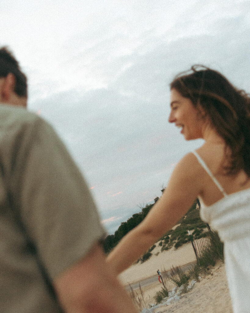 Couple walking down the road during their engagement session