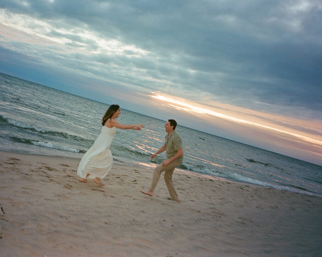 Couple playing on the beach