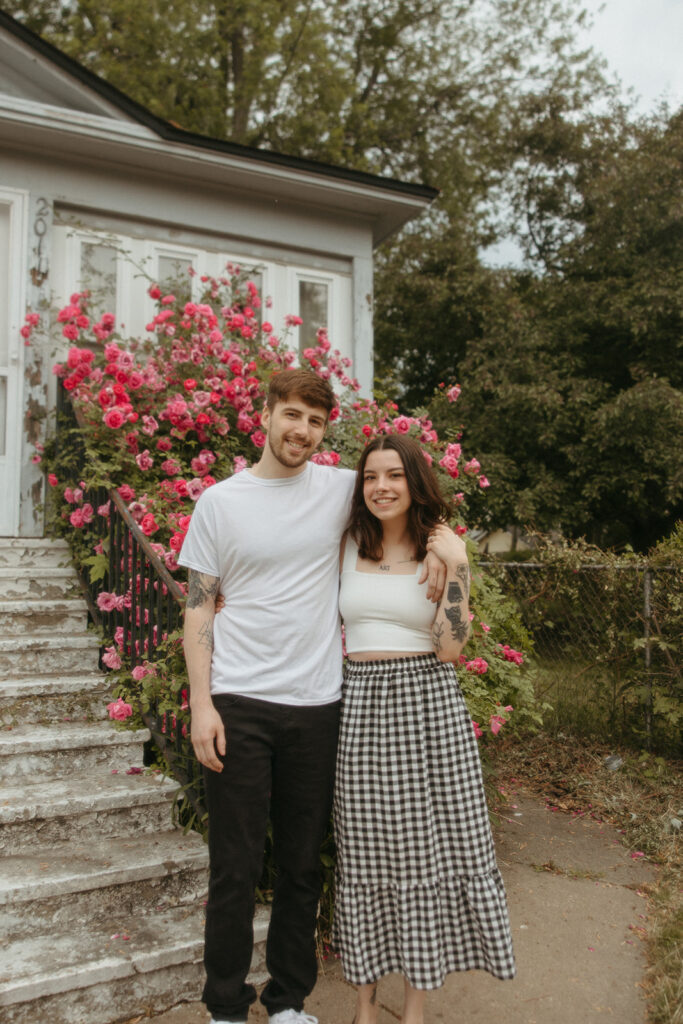 Couple posing for their Bay City engagement photos