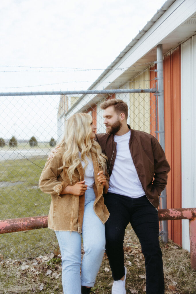 Couples Midwest grunge engagement photos in Detroit, Michigan