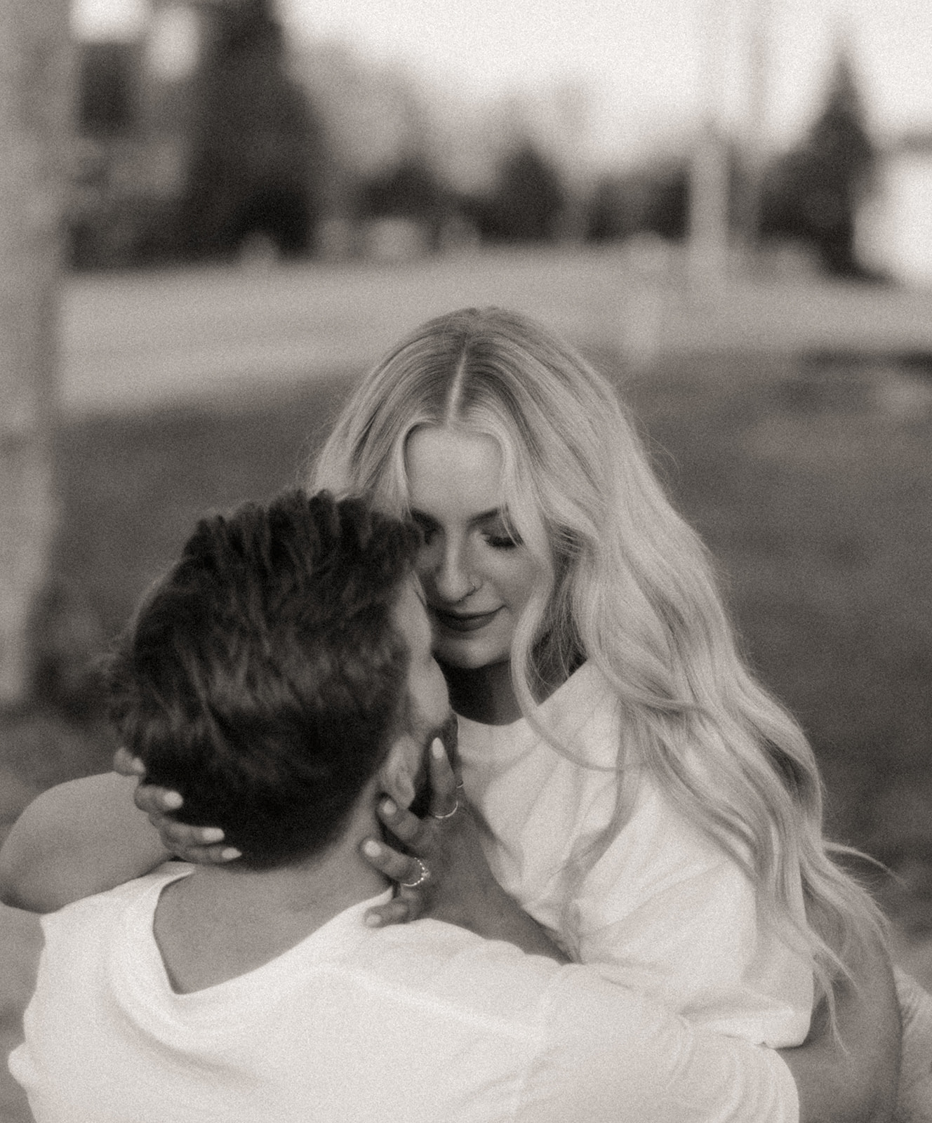 Black and white photo of a couples Midwest grunge engagement shoot