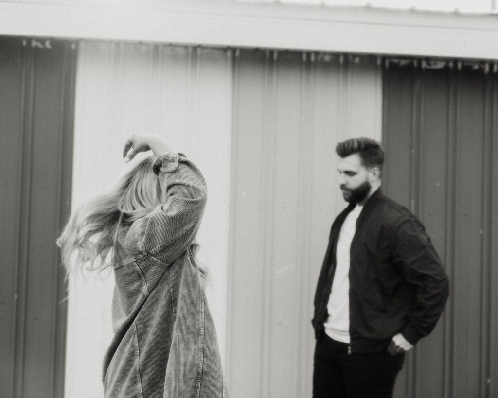 Black and white photo of a couple posing for their Midwest engagement photos 