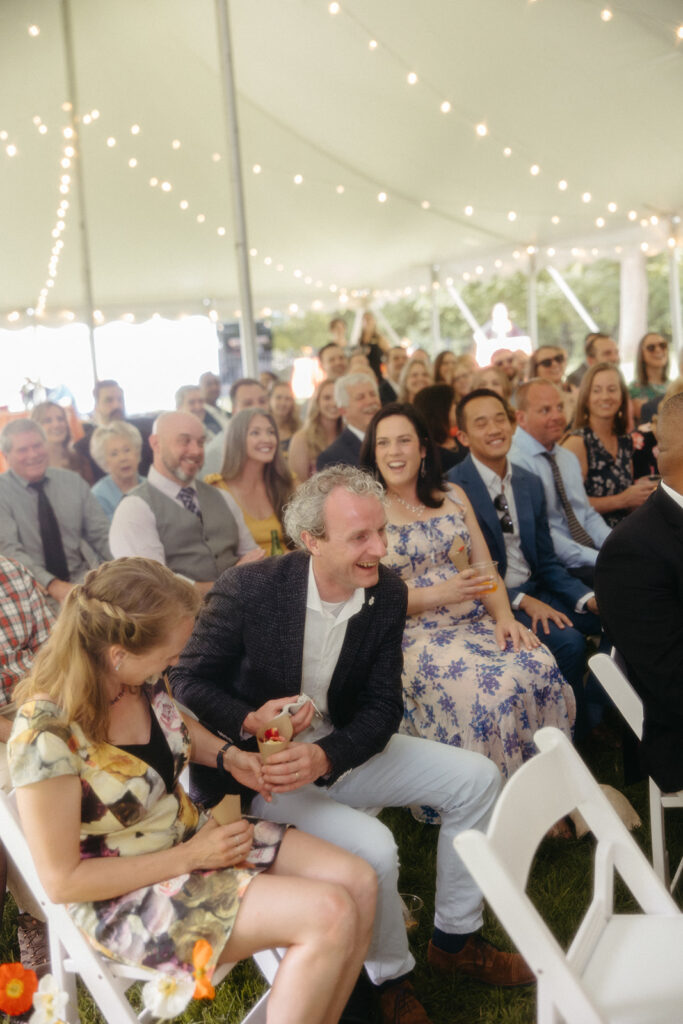 Wedding guest finding rings underneath his seat