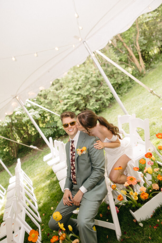 Outdoor bride and grooms portraits from a colorful backyard Ann Arbor wedding