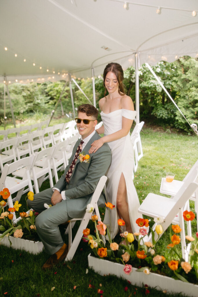 Outdoor bride and grooms portraits from a colorful backyard Ann Arbor wedding