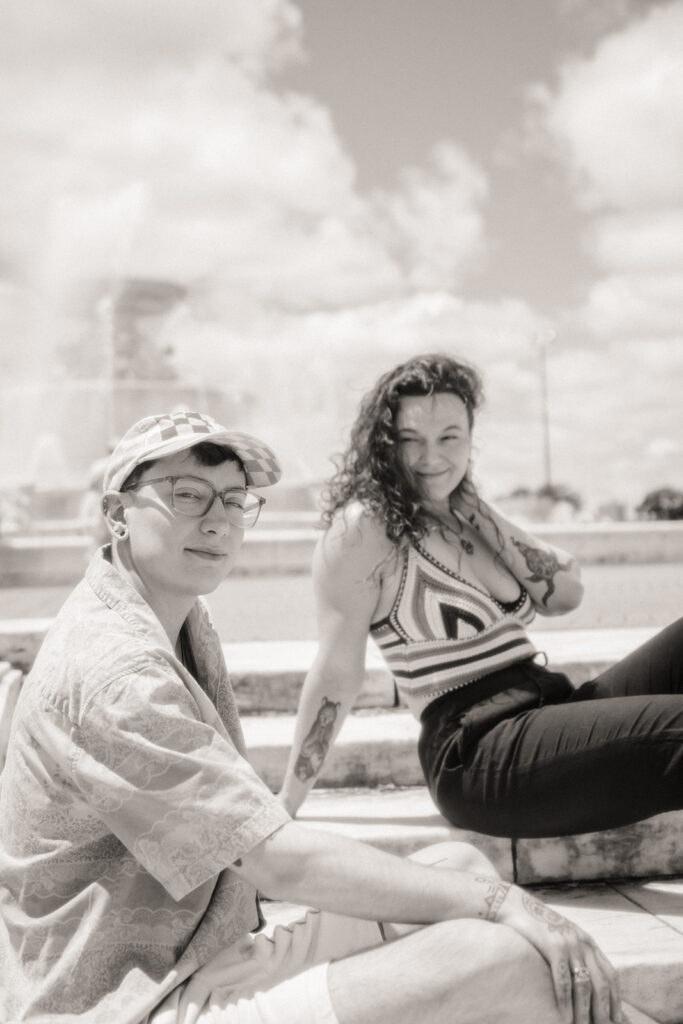 Couple posing near the water fountain in Belle Isle in Detroit, Michigan